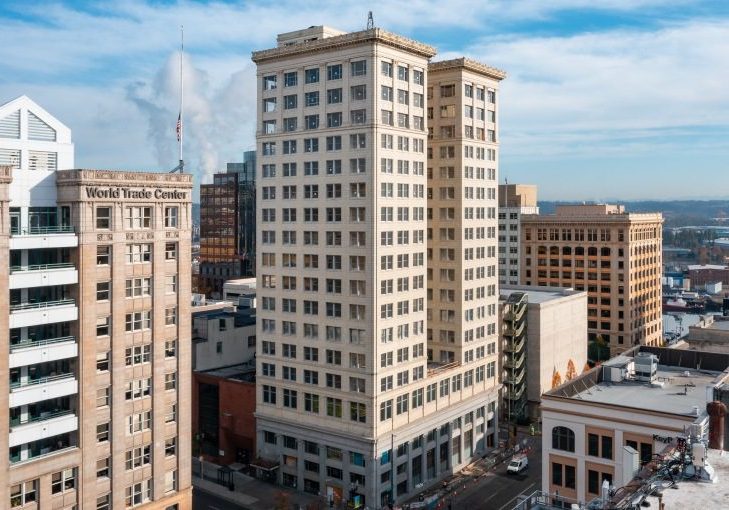 An exterior view of the historic Washington Building in Tacoma on a sunny day